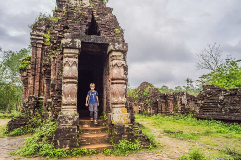 Child exploring My Son ancient temple